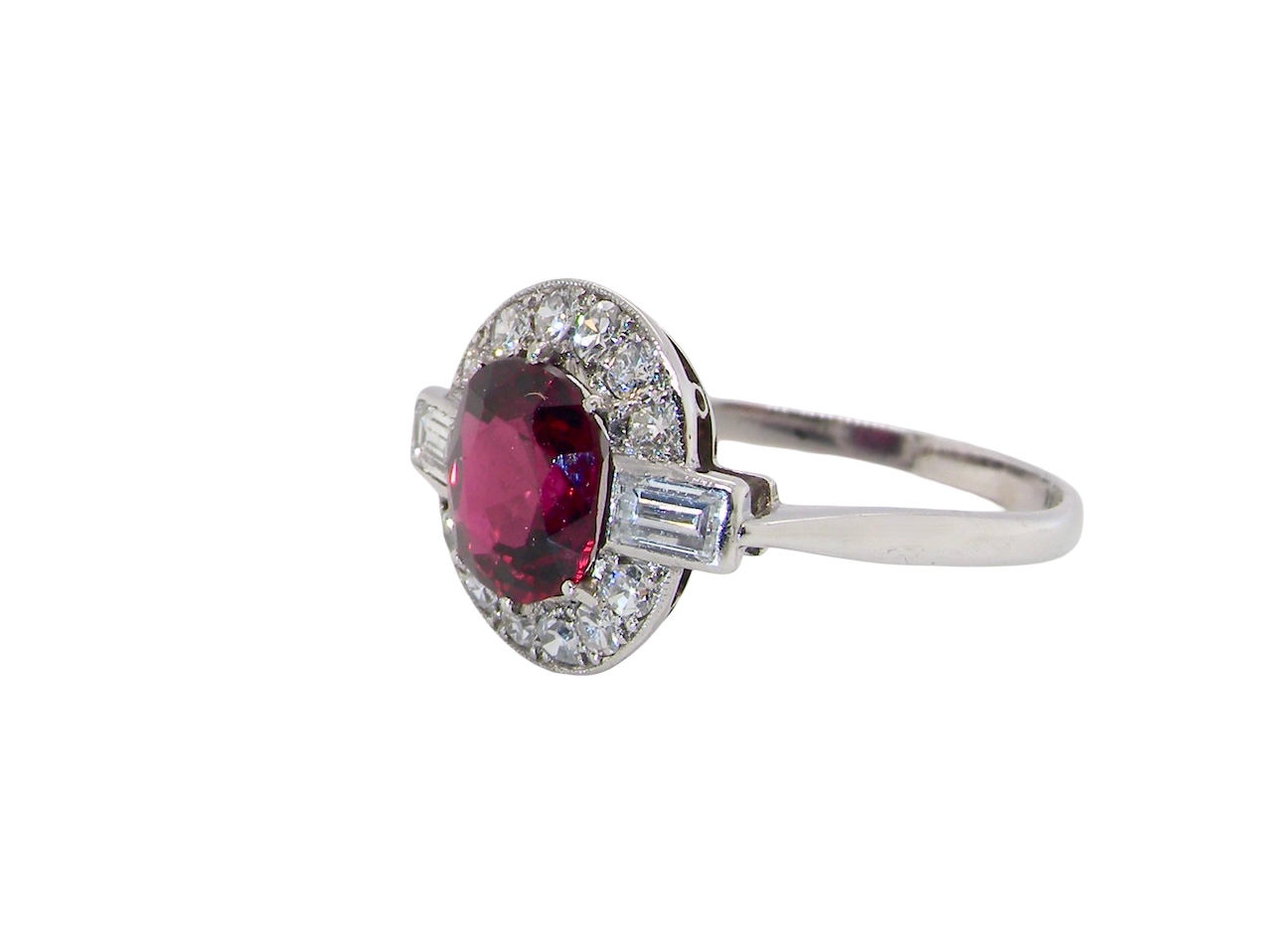 side fine Art Deco style cluster ring featuring an untreated natural ruby
