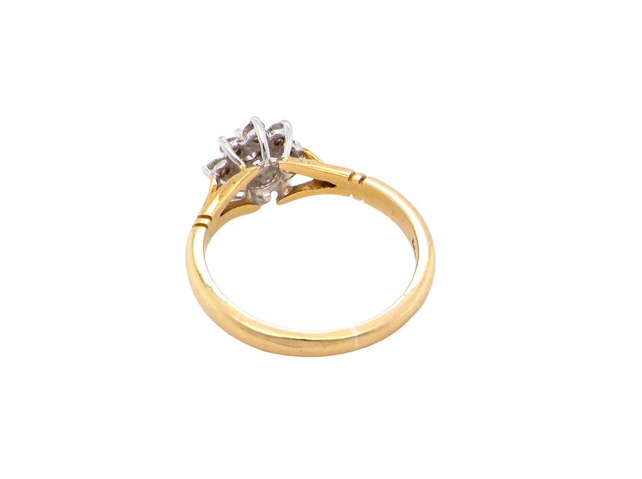 rear pretty cluster ring set with nine brilliant-cut white diamonds.