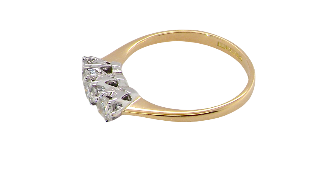 side ring is set with three brilliant cut white diamonds, each 3mm diameter. (total estimated at 0.30 carats) Colour h-j, clarity Si. Claw set head, white gold,