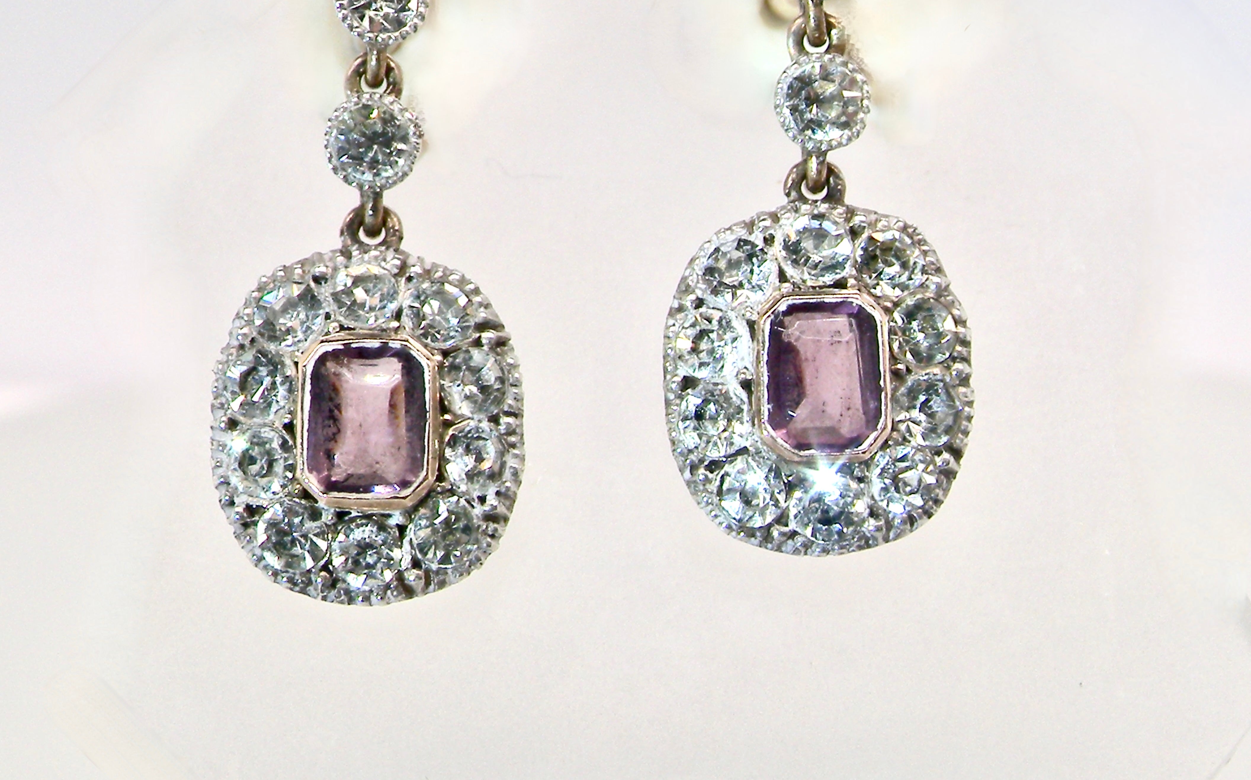 silver pair of drop earrings from. the glamour era of the Edwardian era.