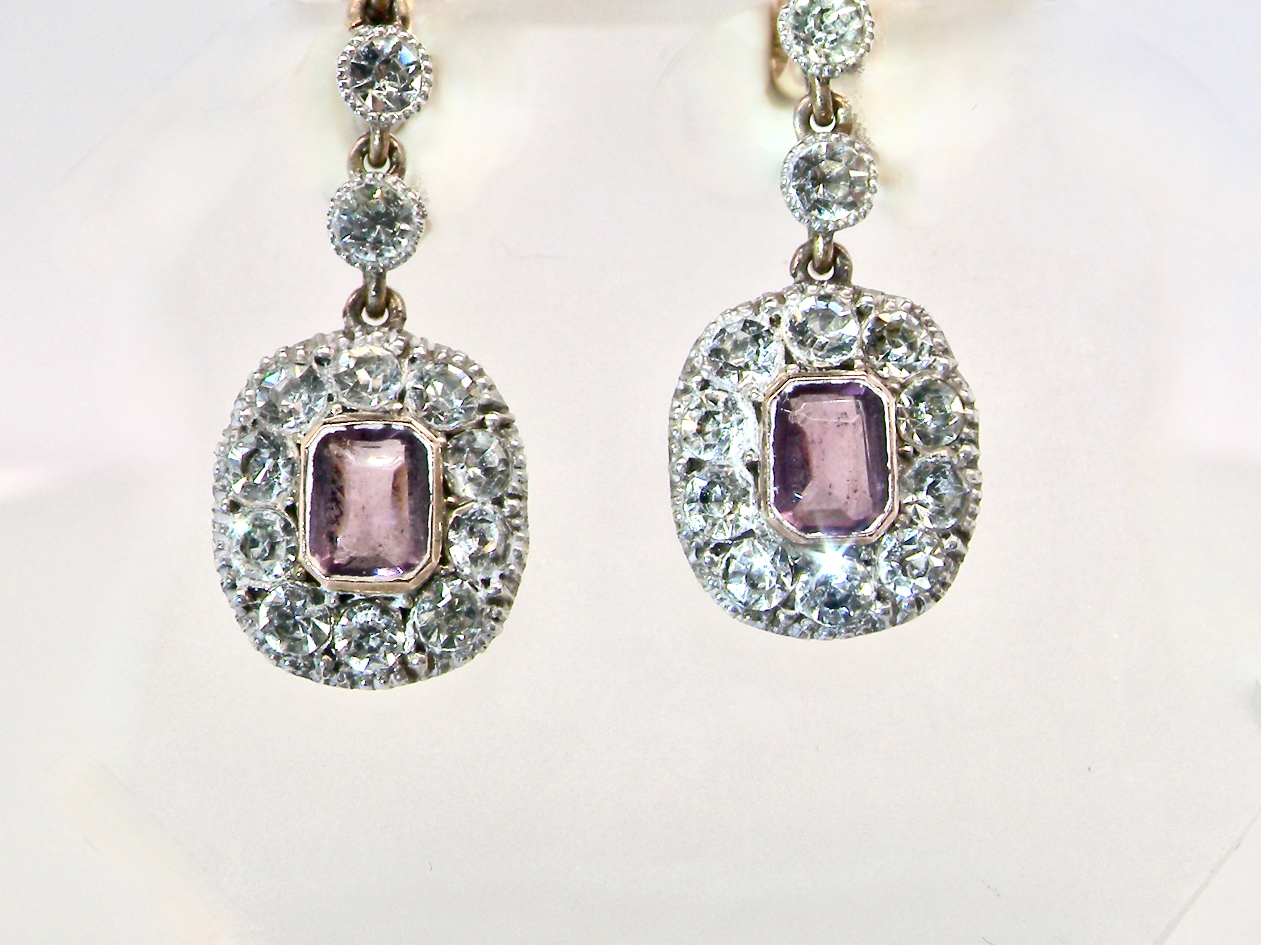 silver pair of drop earrings from. the glamour era of the Edwardian era.