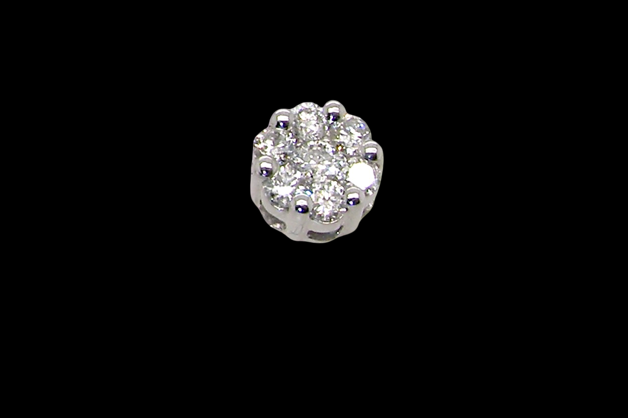 single A pair of 9 carat white gold diamond stud earrings.
Set as a cluster
