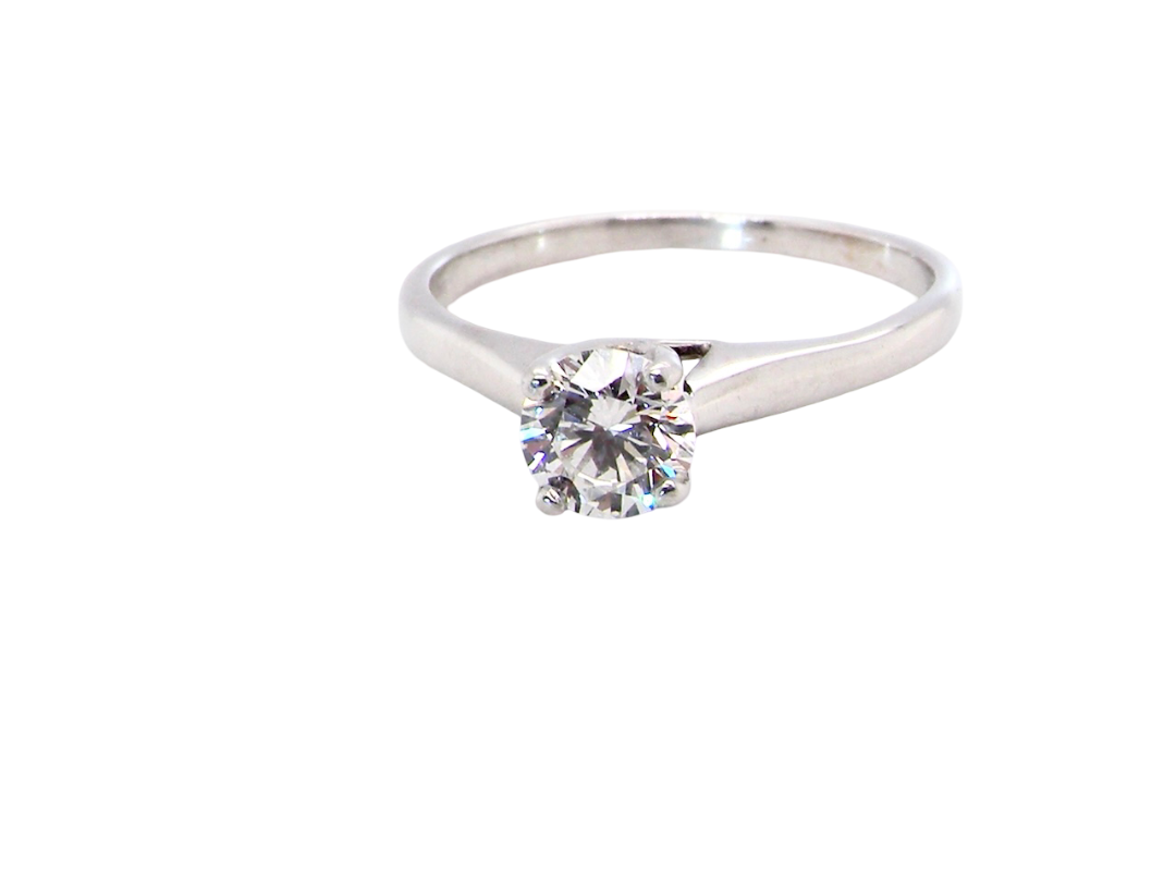 solitaire ring containing a fine modern brilliant cut white diamond. Measures 5.4mm (.53 carats)
Colour G-h, clarity Si. Modern feature under setting, depth 6.8mm,