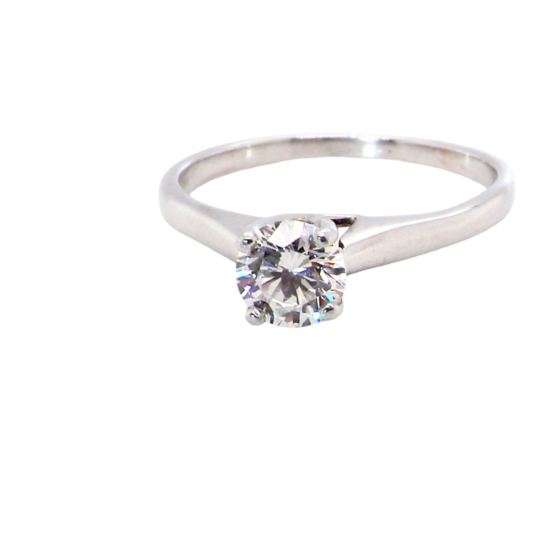solitaire ring containing a fine modern brilliant cut white diamond. Measures 5.4mm (.53 carats)
Colour G-h, clarity Si. Modern feature under setting, depth 6.8mm,