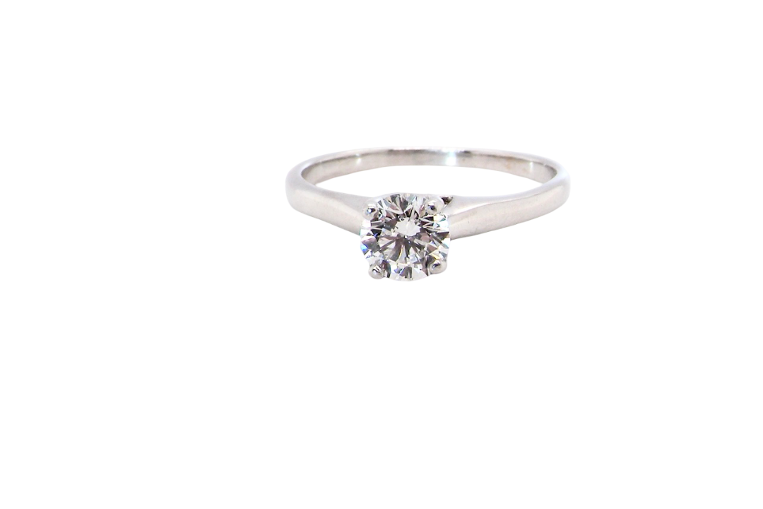 solitaire ring containing a fine modern brilliant cut white diamond. Measures 5.4mm (.53 carats)
Colour G-h, clarity Si. Modern feature under setting, depth 6.8mm, weight 2.6grams.