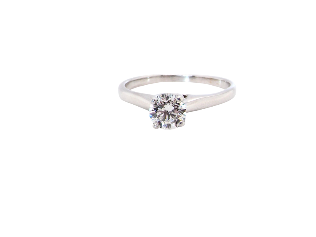 solitaire ring containing a fine modern brilliant cut white diamond. Measures 5.4mm (.53 carats)
Colour G-h, clarity Si. Modern feature under setting, depth 6.8mm, weight 2.6grams.