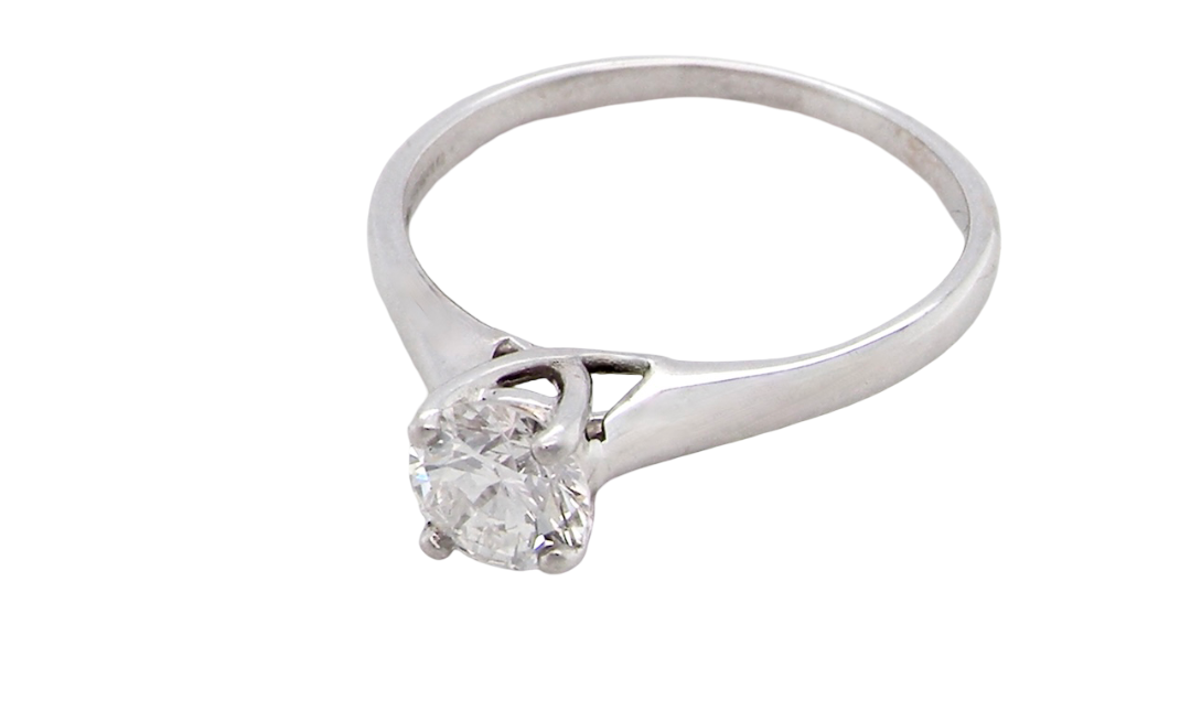 solitaire ring containing a fine modern brilliant cut white diamond. Measures 5.4mm (.53 carats)
Colour G-h, clarity Si. Modern feature under setting, depth 6.8mm, weight 2.6grams.
above