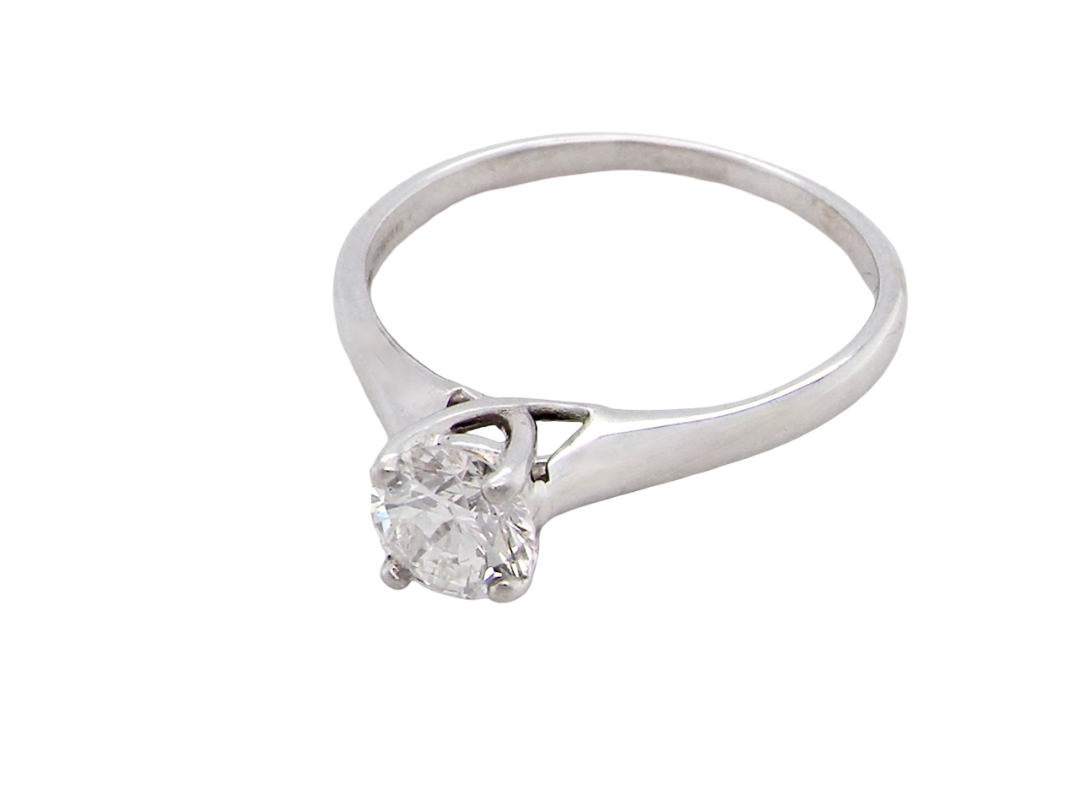 solitaire ring containing a fine modern brilliant cut white diamond. Measures 5.4mm (.53 carats)
Colour G-h, clarity Si. Modern feature under setting, depth 6.8mm, weight 2.6grams.
above