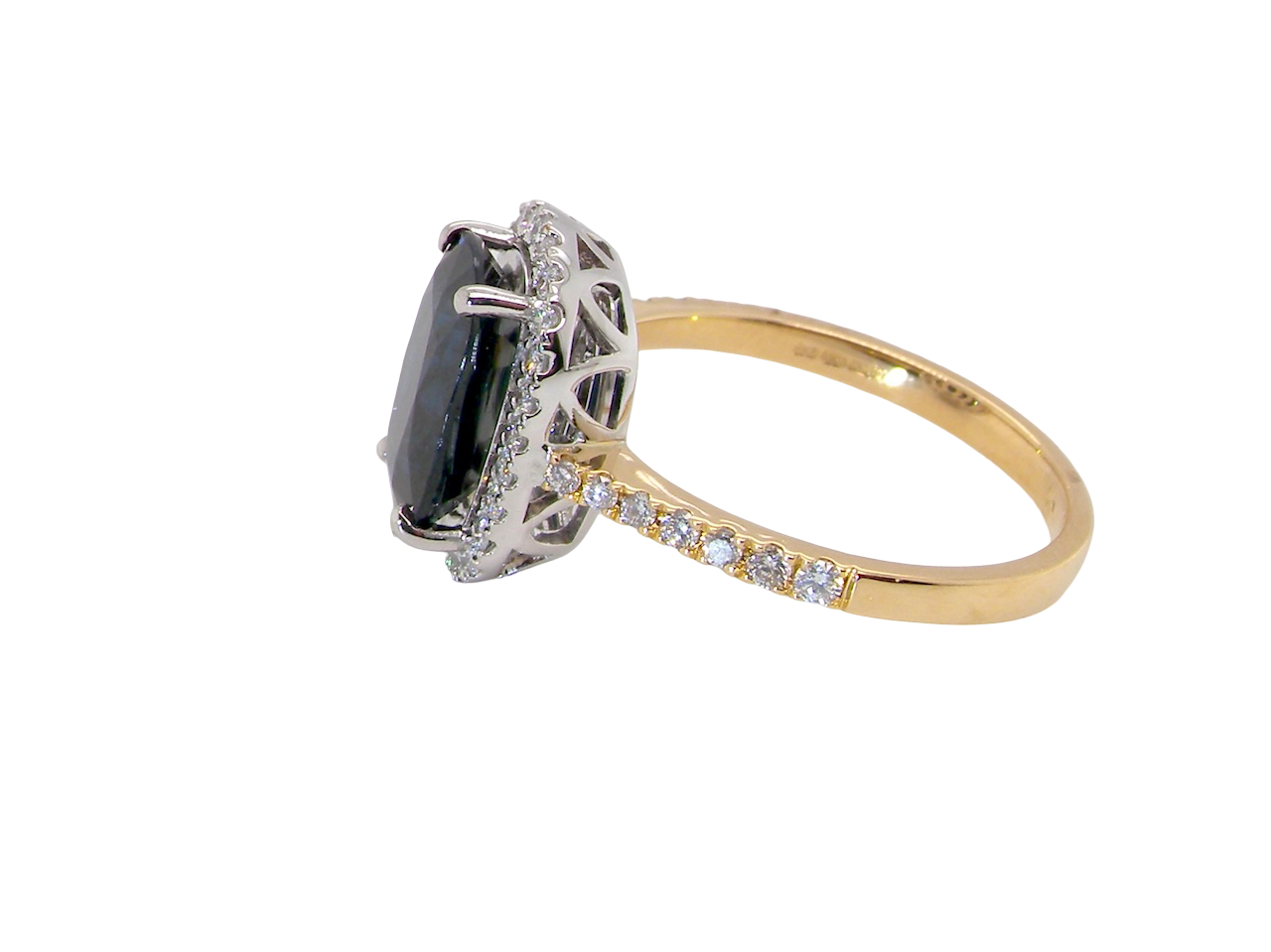 striking cluster ring featuring a captivating ink-black blue sapphire,A