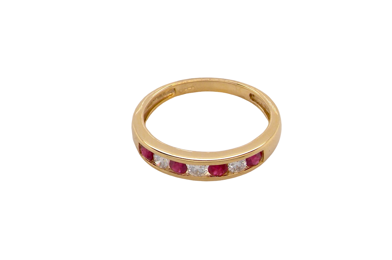 A channel set Ruby and Diamond ring