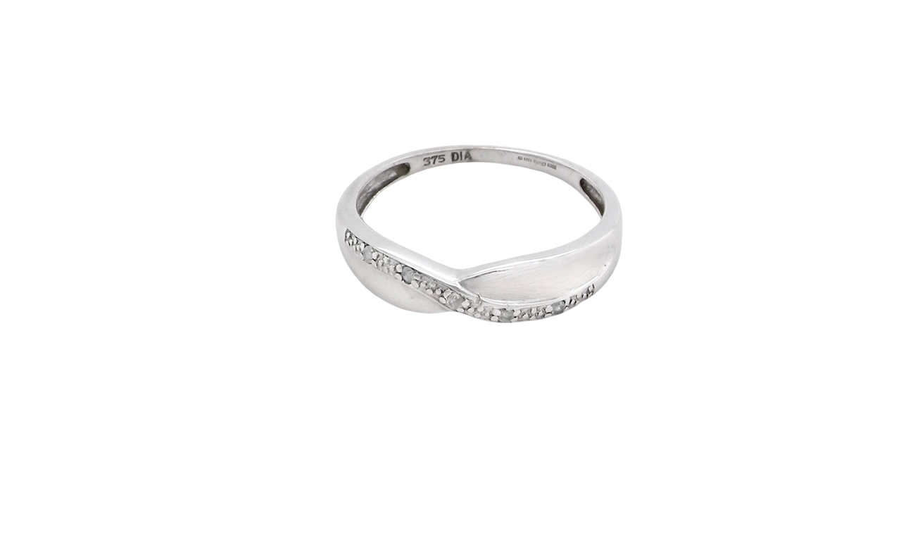 top A half hoop 9 carat white gold eternity ring. Set with five small white diamonds, each 1.3mm (total 0.05 carats)
