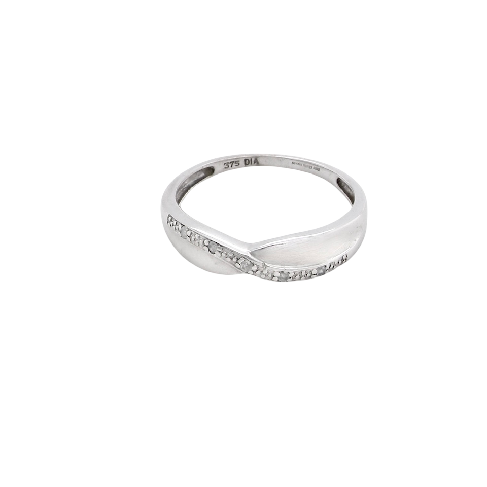 top A half hoop 9 carat white gold eternity ring. Set with five small white diamonds, each 1.3mm (total 0.05 carats)