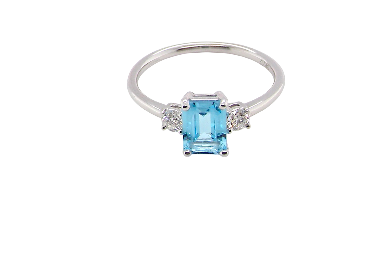 top A 9 carat white gold three stone ring. This ring is from our Heirloom Collection. This is when we take a stone from a pre-owned ring that is worn out, and reset it into a brand new setting.