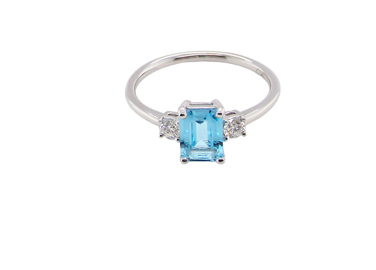 top A 9 carat white gold three stone ring. This ring is from our Heirloom Collection. This is when we take a stone from a pre-owned ring that is worn out, and reset it into a brand new setting.