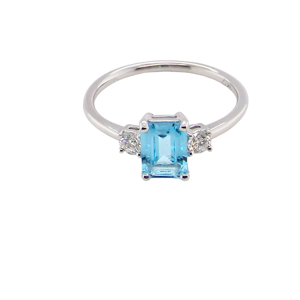 top A 9 carat white gold three stone ring. This ring is from our Heirloom Collection. This is when we take a stone from a pre-owned ring that is worn out, and reset it into a brand new setting.