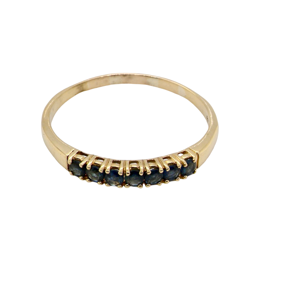 A sapphire half hoop eternity ring