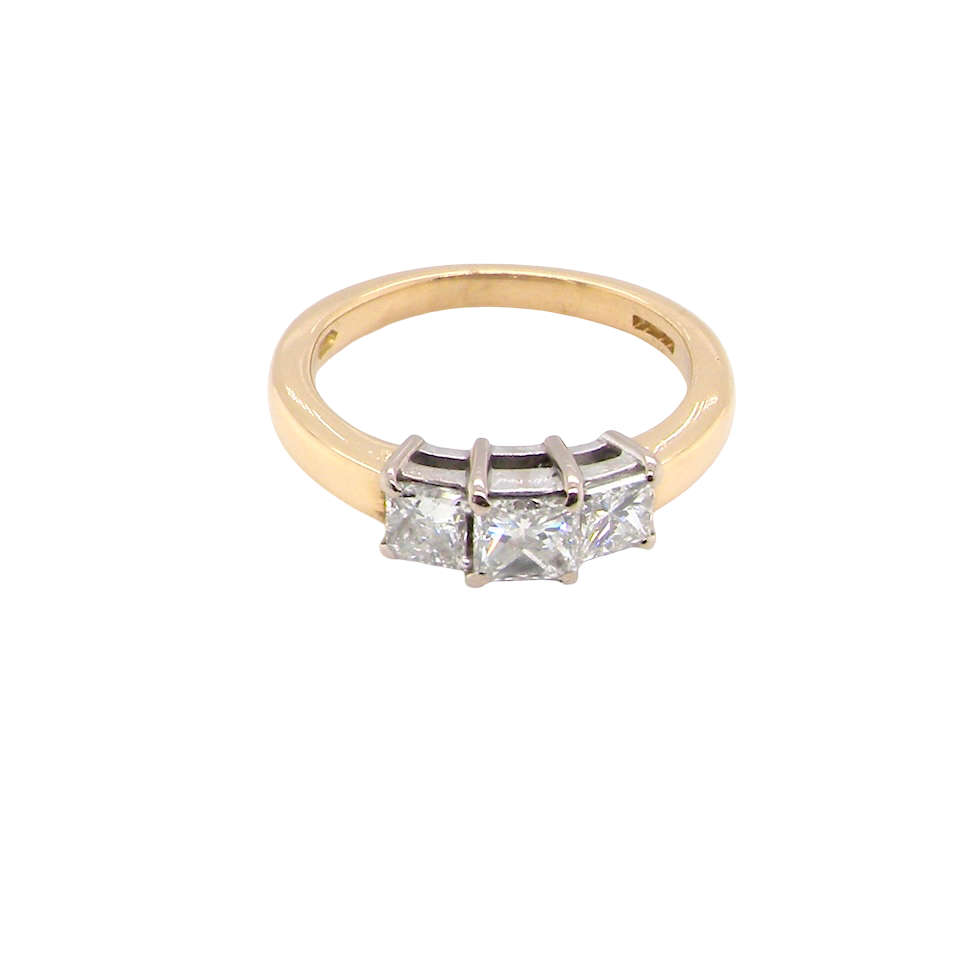 Gold ring with two diamonds on a white background