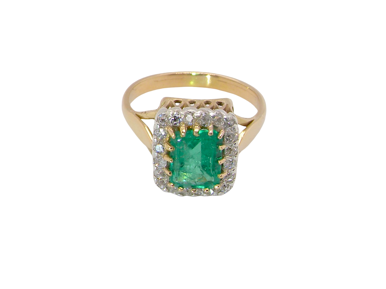 An Emerald and Diamond Cluster Ring, Circa 1950–1960
