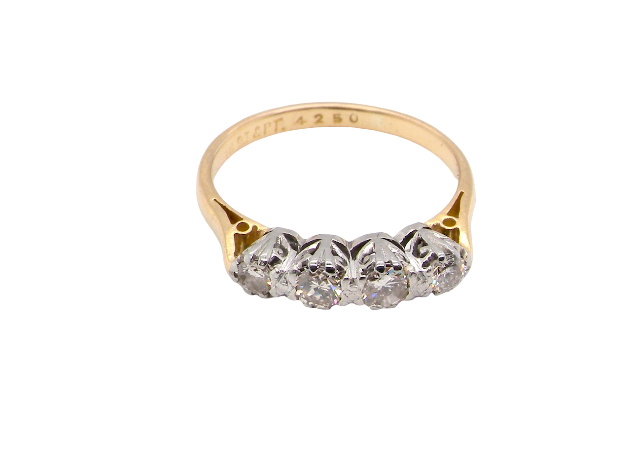 top An early 20th century ring set with diamonds.