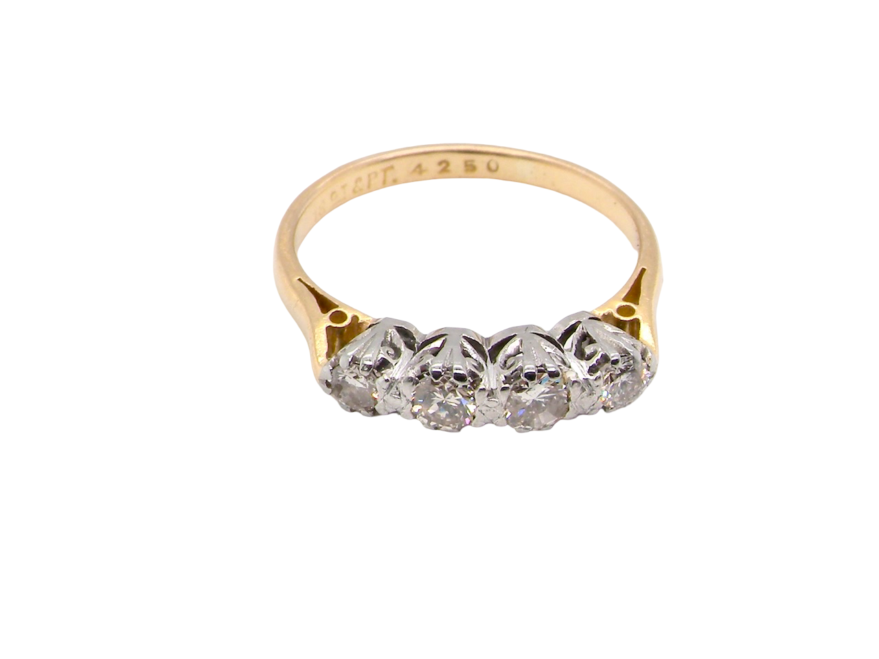 top An early 20th century ring set with diamonds.
