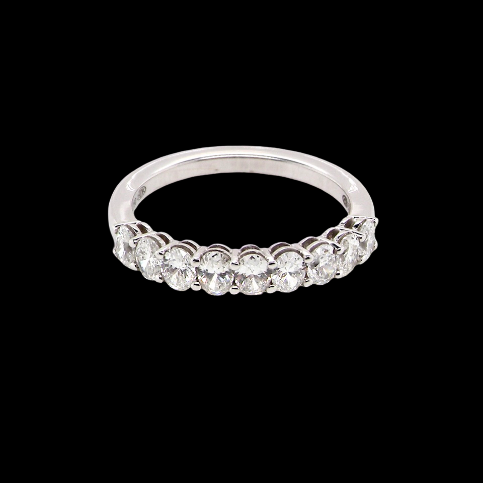 top gorgeous half-hoop eternity ring set with nine oval brilliant-cut white diamonds.