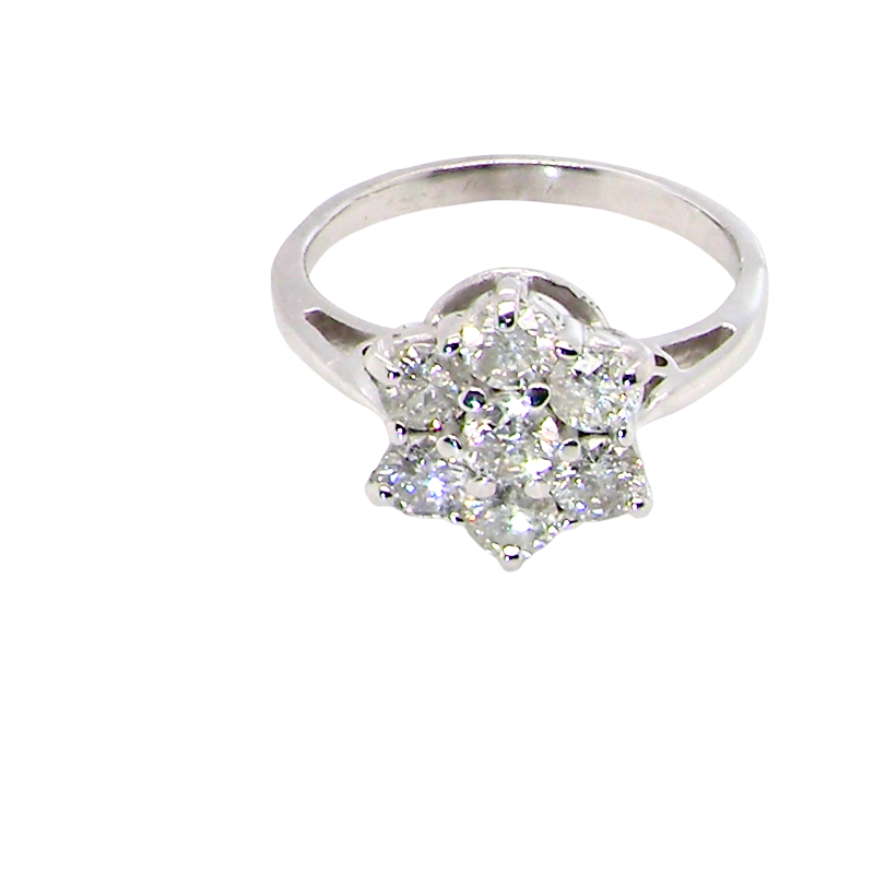 top view A beautiful vintage diamond cluster ring, elegantly set with seven brilliant-cut white diamonds in a timeless floral cluster design.