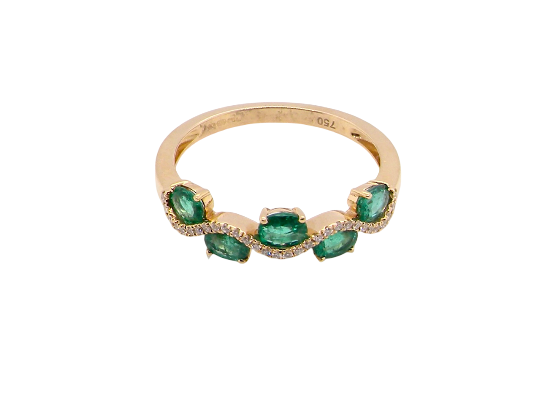 top view A half hoop ring with a very attractive line of oval cut emeralds, each 4x3mm, a lovely deep grass green hue, and with very good clarity too.