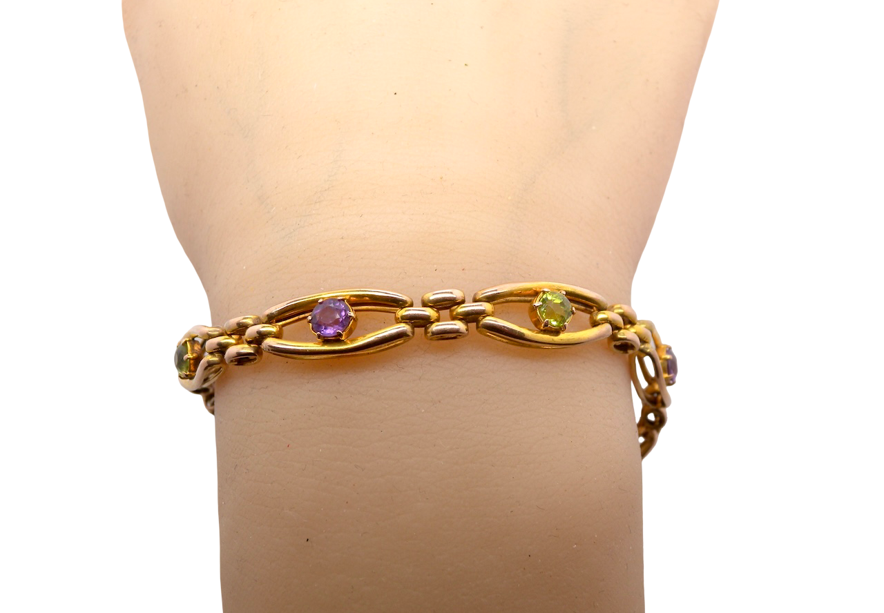 wrist exquisite early 20th century bracelet set with 4.5mm peridot and amethyst stones,