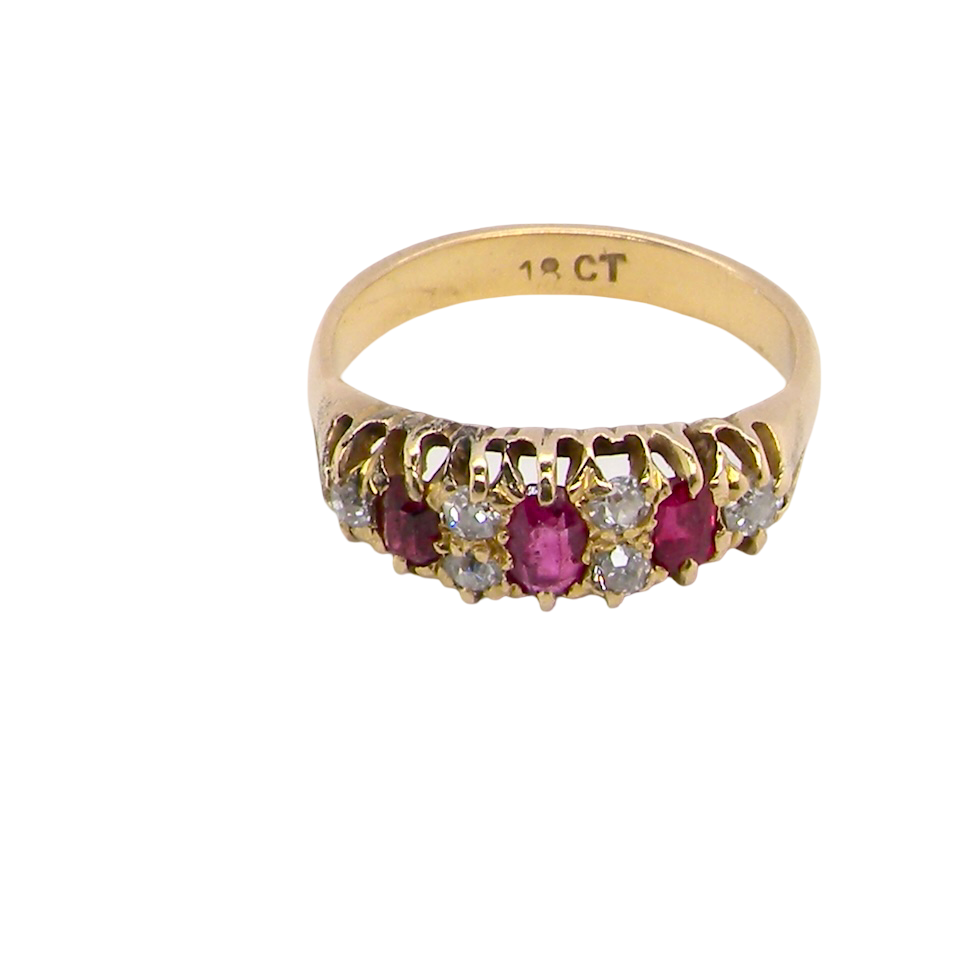 top typical boat shaped ring from the late Victorian era, probably 1890-1900. This ring is set with three oval cut rubies,
