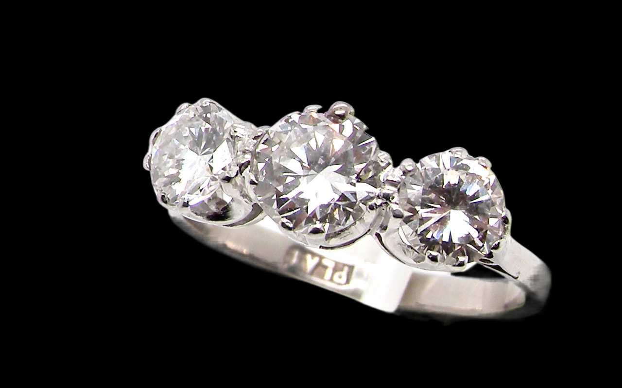 Diamond trilogy ring