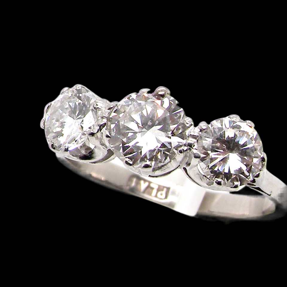 Diamond trilogy ring