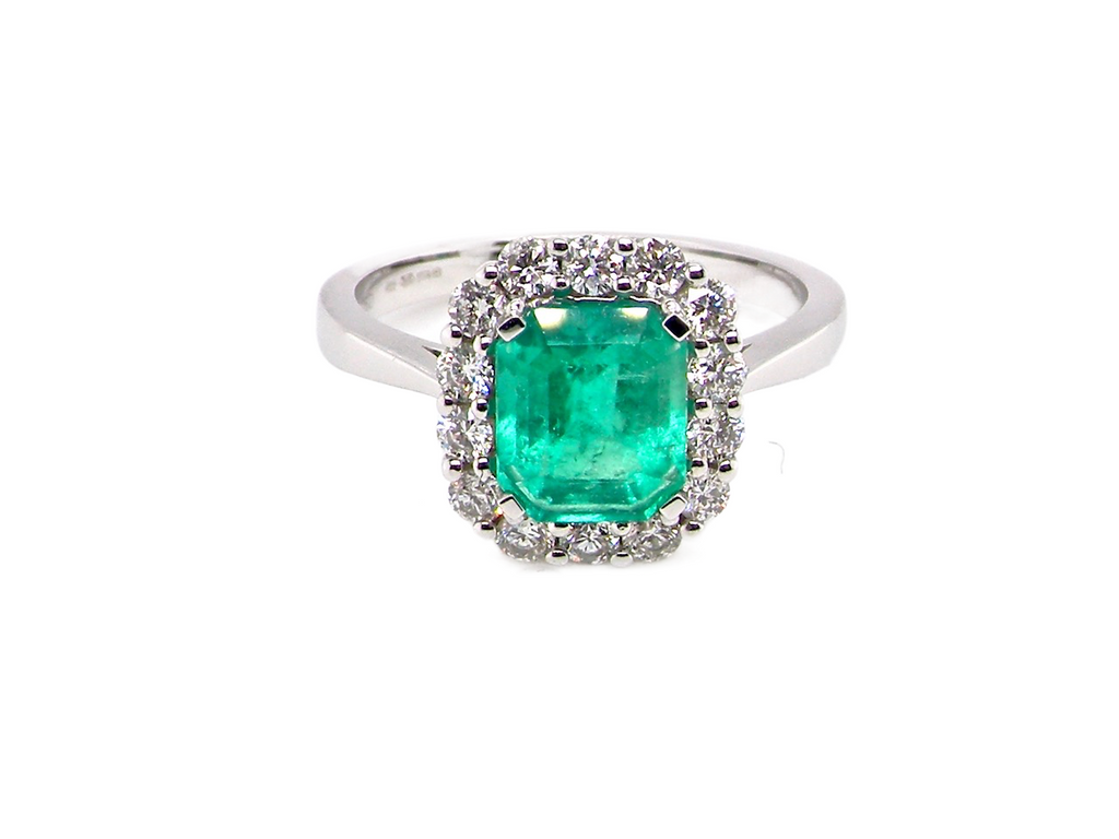 Vintage emerald and diamond cluster ring