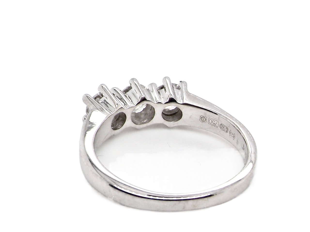 white gold three stone diamond ring