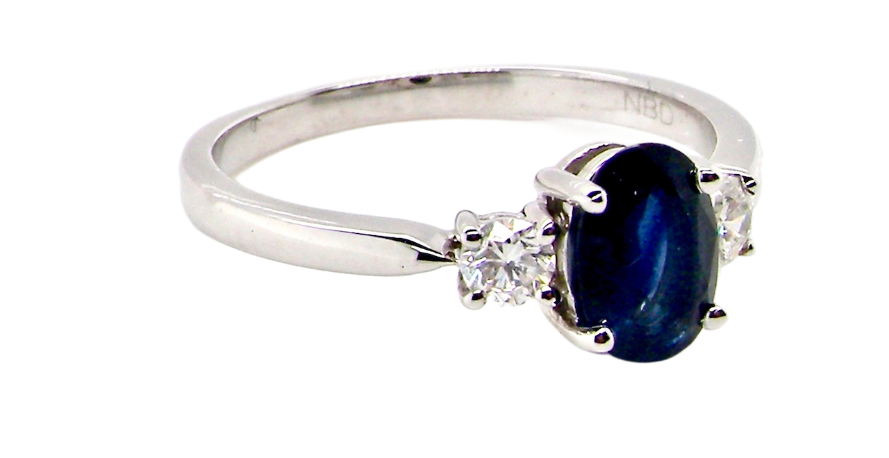 18ct white gold three stone sapphire and diamond ring