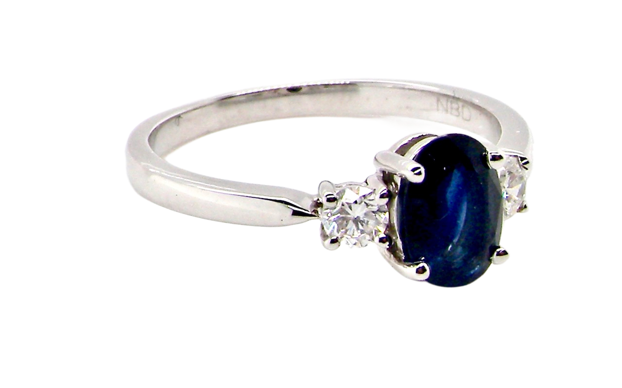 18ct white gold three stone sapphire and diamond ring