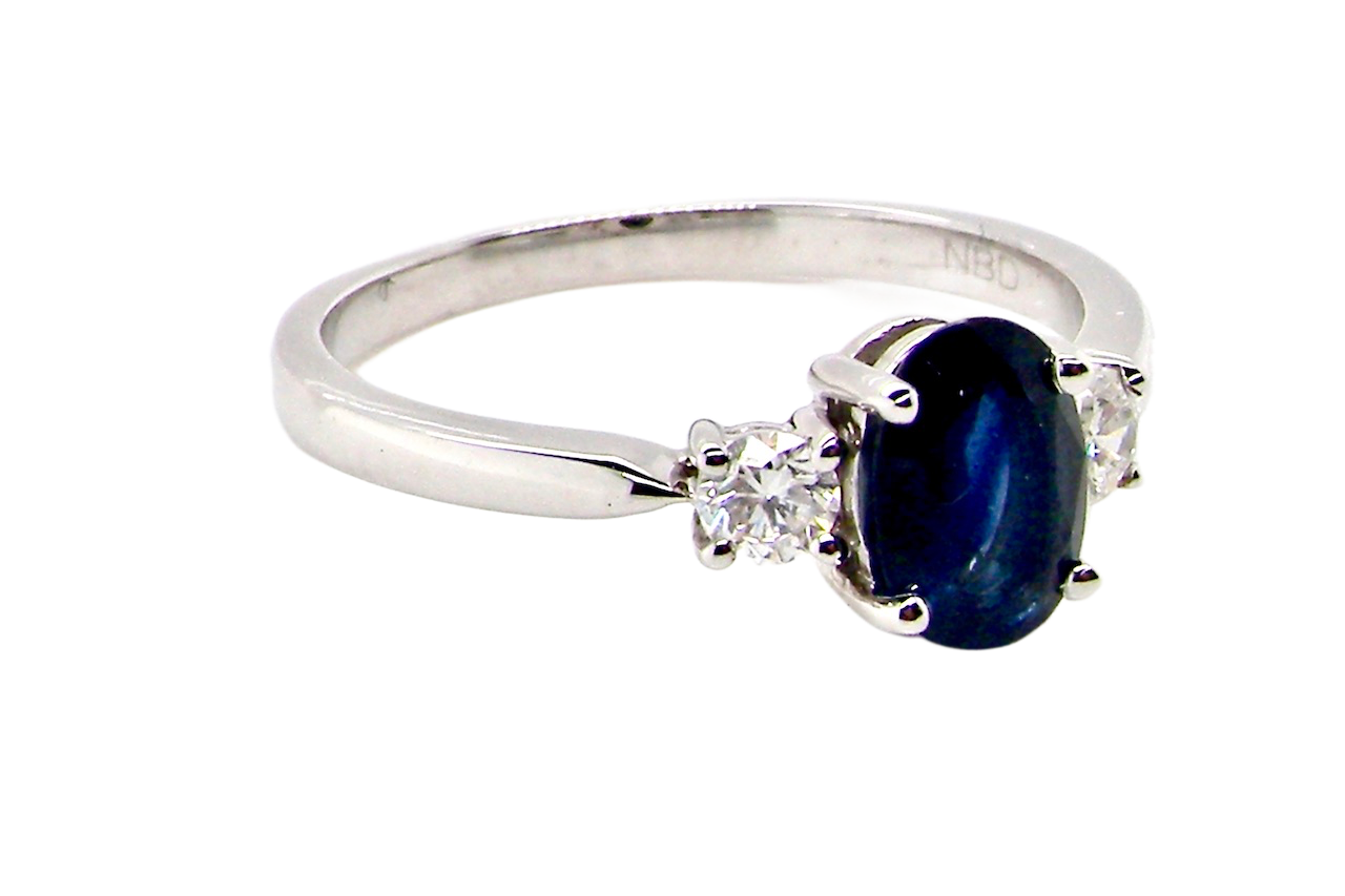 18ct white gold three stone sapphire and diamond ring