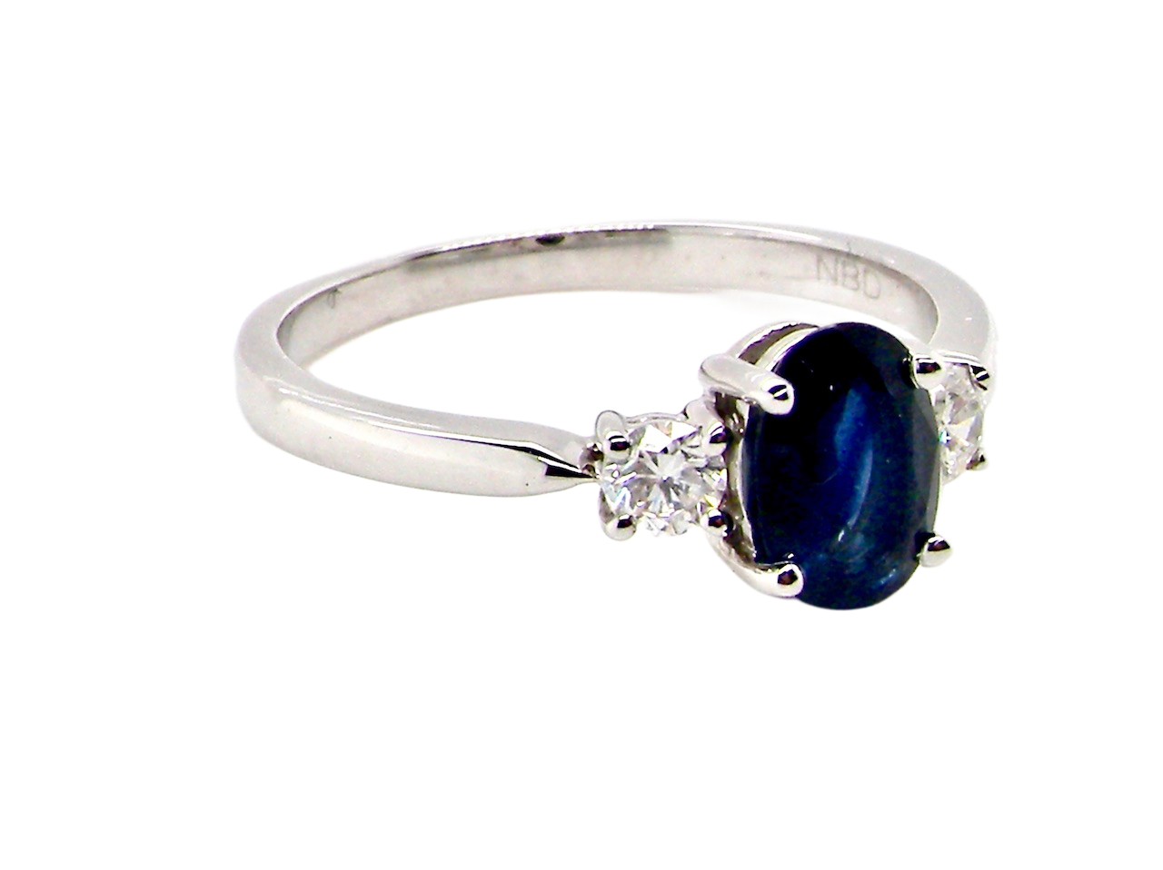 18ct white gold three stone sapphire and diamond ring