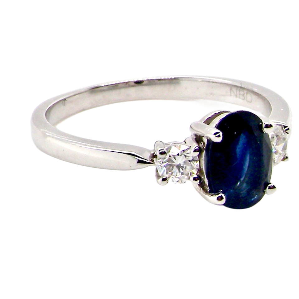 18ct white gold three stone sapphire and diamond ring