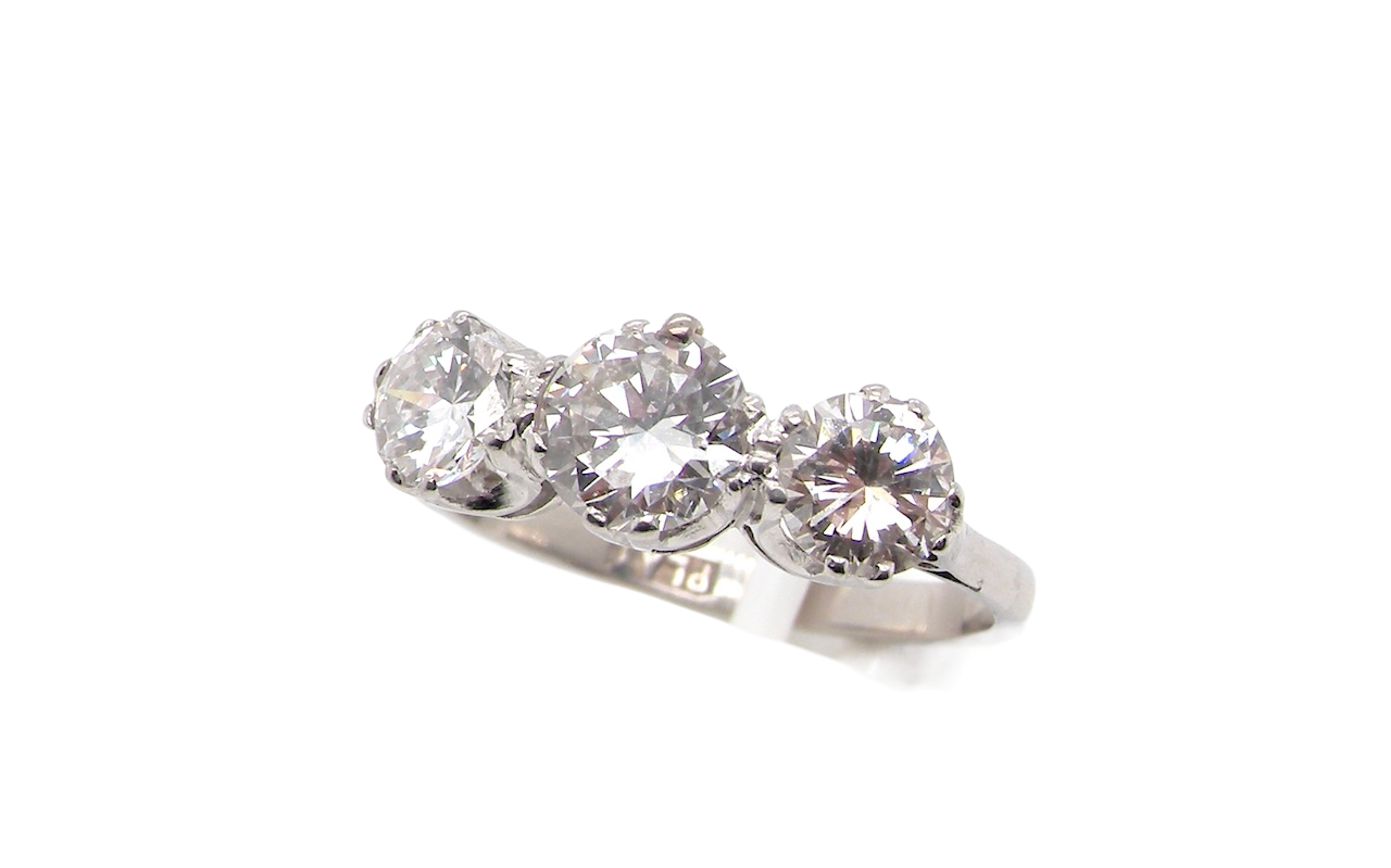 A platinum diamond trilogy ring
