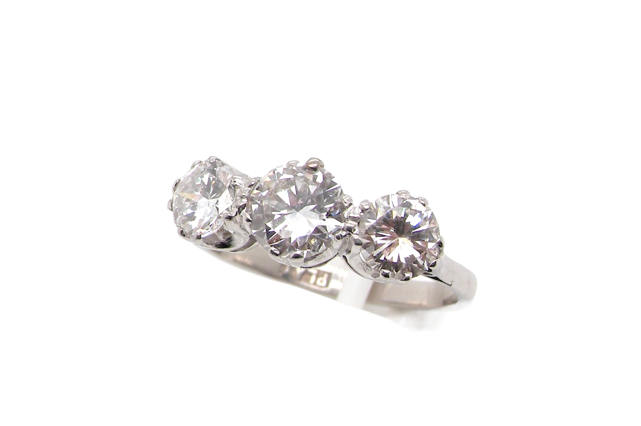 A platinum diamond trilogy ring