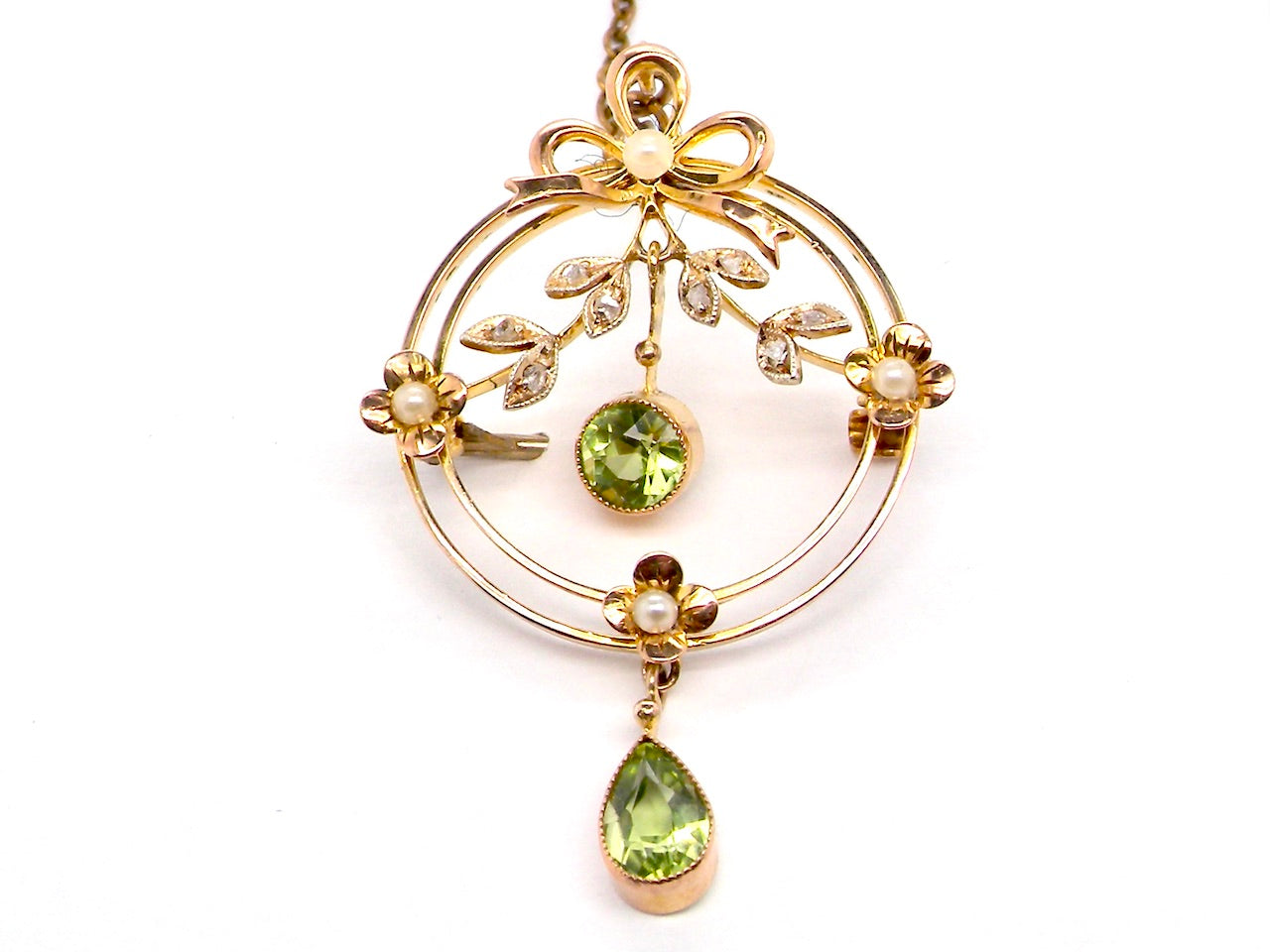 early 20th century antique pearl and peridot brooch
