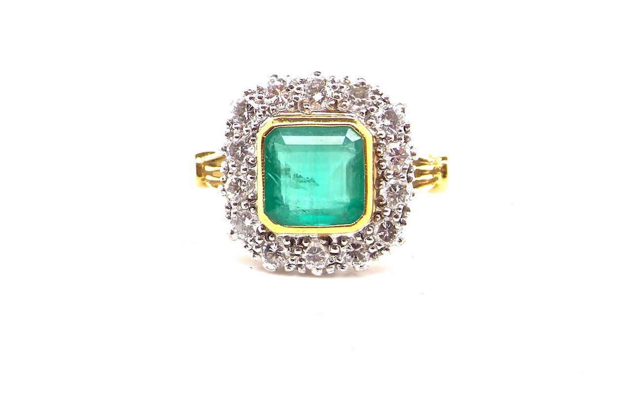vintage emerald and diamond cluster ring