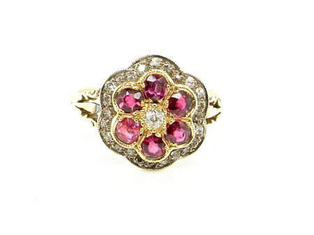 An antique ruby and diamond cluster ring