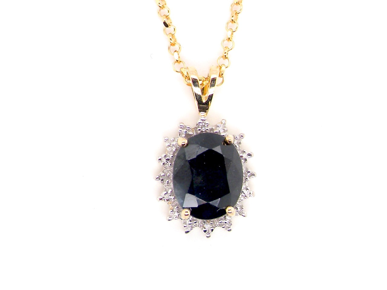 9 carat gold sapphire and diamond pendant