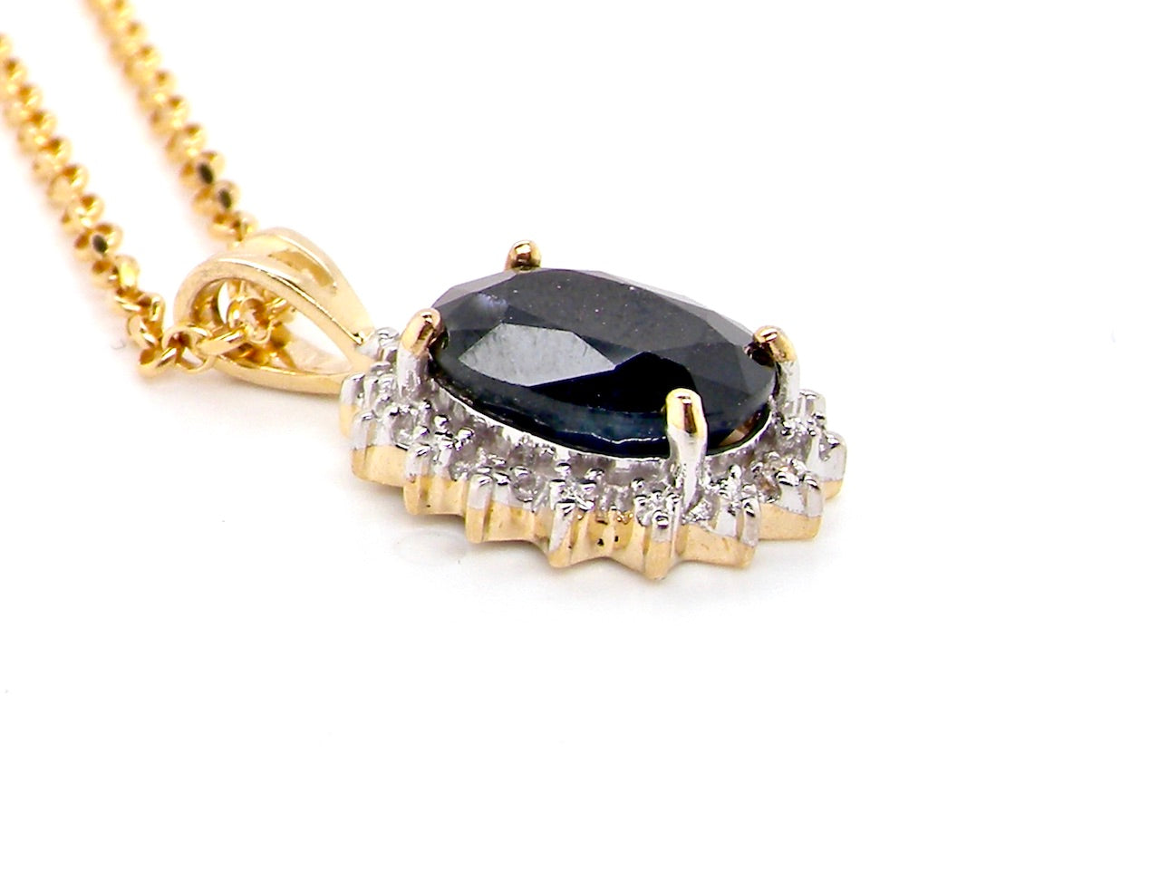 new gold sapphire and diamond pendant