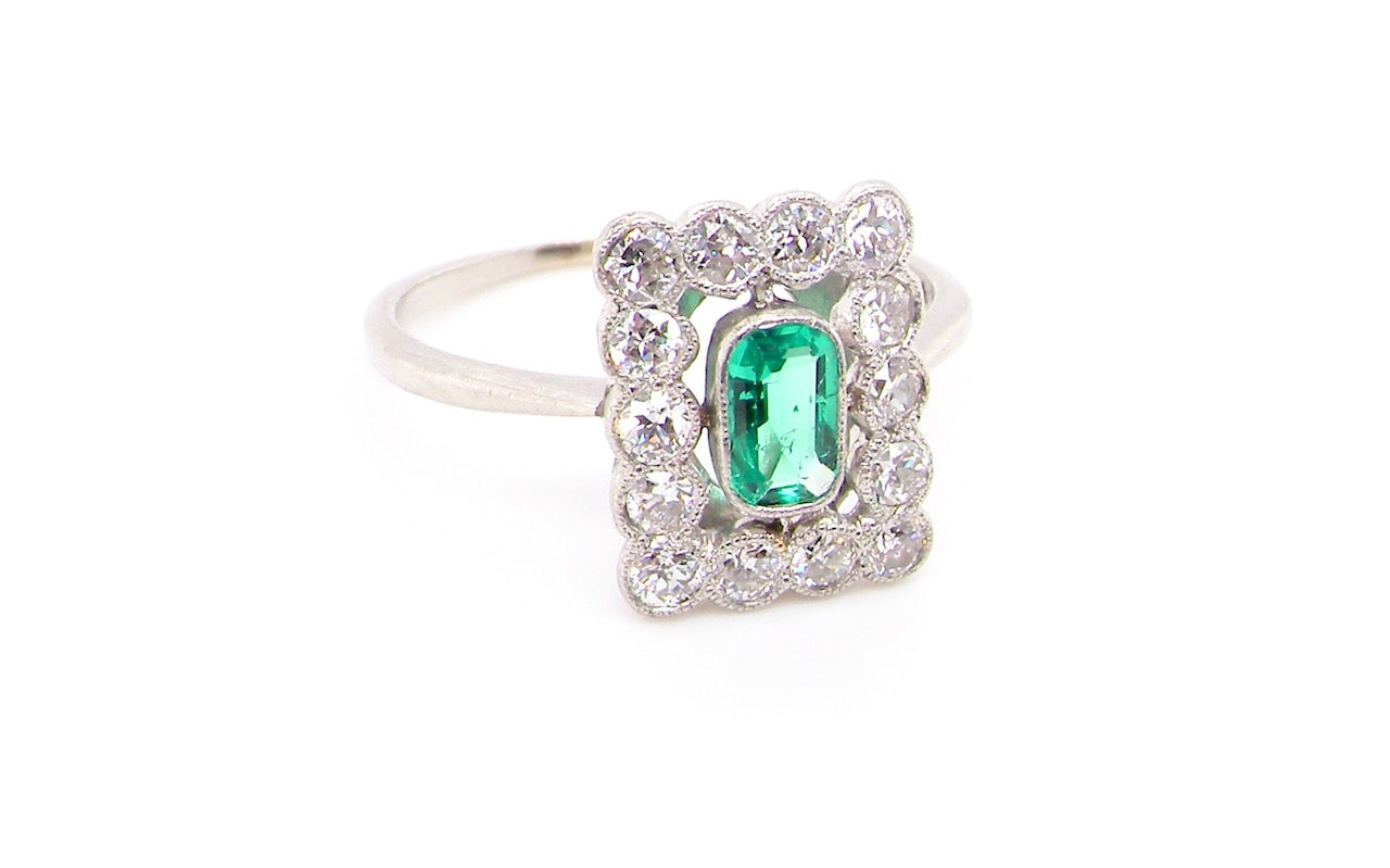 emerald and diamond cluster ring