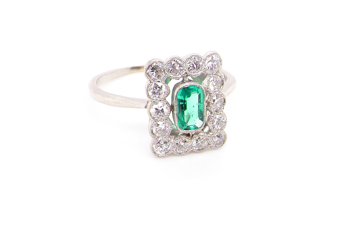 emerald and diamond cluster ring