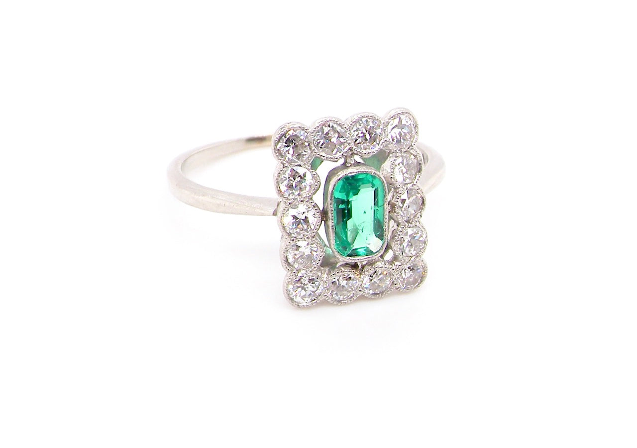 emerald and diamond cluster ring