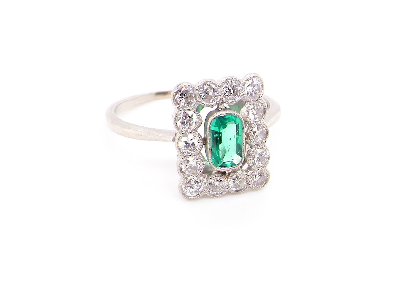 emerald and diamond cluster ring