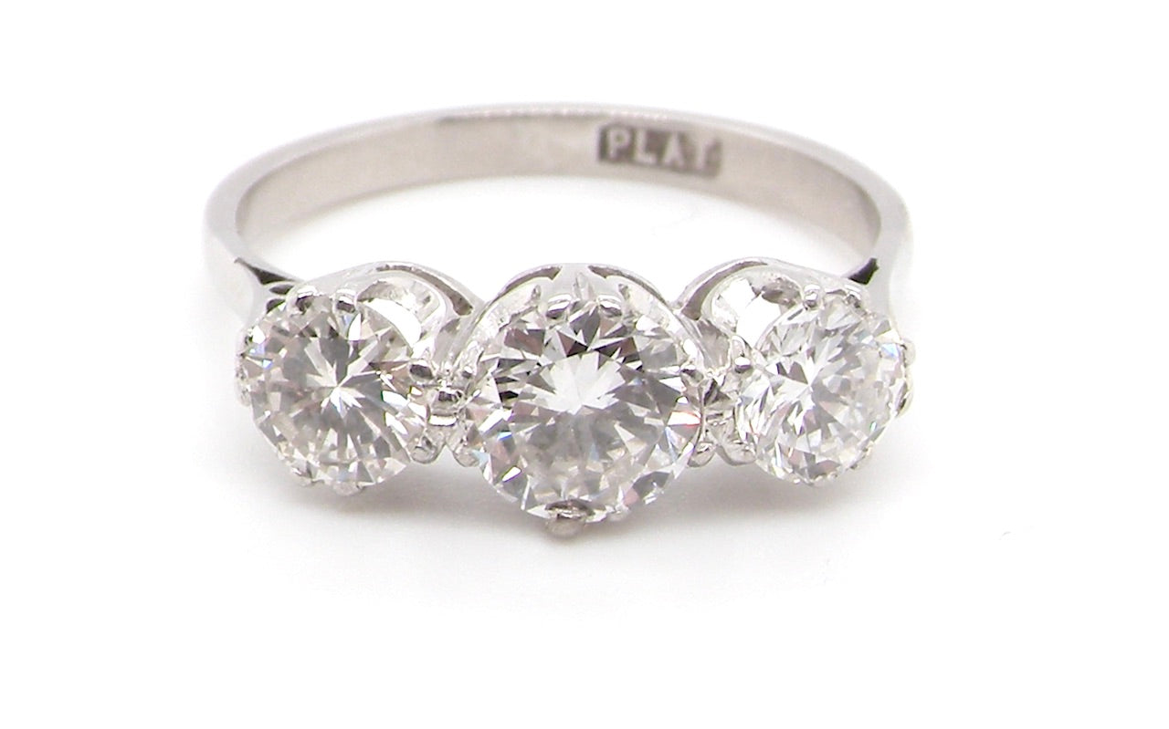 art deco three stone diamond trilogy ring